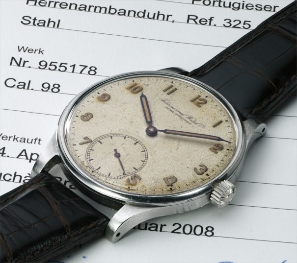 A rare and oversized stainless steel wristwatch with luminous Arabic numerals and hands